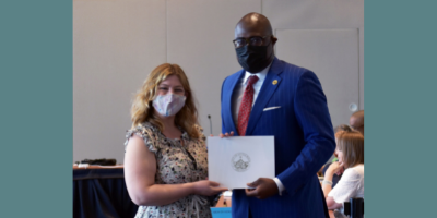 Geneva Galloway receiving participation award from Mayor Frank Scott